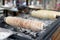 Baking of czech trdelnik