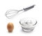 Baking ingredients - balloon whisk, egg and flour