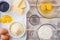 Baking ingredients for a lemon cake - flour, eggs, butter