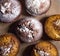 Baking muffins, homework cupcakes decorated with gold and silver dressing, powdered sugar