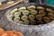 Baking naan flat breads in the tradional stove