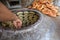 Baking naan flat breads in the tradional stove,