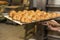 baking pastries and bread in an oven at a bakery