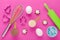 Baking protein, eggs and kitchen tools with cookie cutter on pink background