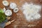 Baking scene atmospheric kitchen scene flour on wooden table