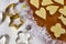 Baking scenery with moon, star, flower shaped cookie cutter, rolled pastry, wheat flour, candied fruit, icing sugar and Japanese