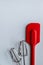 Baking supplies on white. Spatula, mixer whisks on white background