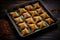 baking tray filled with uncooked baklava