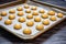 baking tray with uncooked cookies ready for the oven