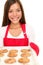Baking woman showing cookies