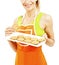 Baking woman showing cookies on tray