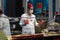 Baklava seller behind the counter of a restaurant on Istiklal Street