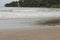 Bako national park, sea sandy beach, overcast, cloudy day, sky and sea. Vacation, travel, tropics concept