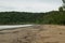 Bako national park, sea sandy beach, overcast, cloudy day, sky and sea. Vacation, travel, tropics concept