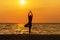 Balance meditation yoga spirit lifestyle mind woman peace vitality, silhouette outdoors on the Sea sunrise,