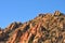 Balance Rock - Desert Terrain Mountain Rocks against a bright Blue Cloudless Sky