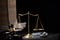 Balance Scale for justice and judge with handcuff, law book and hammer