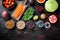 Balanced diet organic healthy food clean eating selection, flat lay on dark wooden background, with space for text