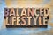 Balanced lifestyle word abstract in wood type