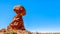 Balanced Rock, a tall and delicate sandstone Rock Formation in the desert landscape of Arches National Park