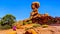 Balanced Rock, a tall and delicate sandstone Rock Formation in the desert landscape of Arches National Park