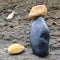 Balanced stones on the beach at Robin Hood`s Bay, UK
