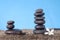 Balanced stones on the sand