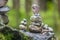 Balancing cairns in the forest