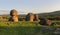 Balancing stones across the landscape