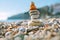 Balancing stones on the beach.