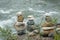 Balancing stones in equilibrium against the backdrop of a mountain river.