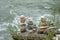 Balancing stones in equilibrium against the backdrop of a mountain river.