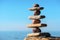 Balancing stones on the seashore