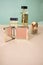 Balans composition and set of decorative cosmetics, blush, perfume, foundation on a green and pink background