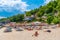 BALCHIK, BULGARIA, JULY 13, 2019: People are enjoying a sunny day on a beach in Balchik, Bulgaria