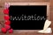 Balckboard With Heart Decoration, Text Invitation, Wooden Background