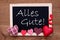 Balckboard With Red Heart Decoration, Text Alles Gute Means Best Wishes