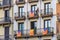 Balconies in Barcelona Spain Gothic Quarter decorated with Catalan independence flag Senyera estelada meaning \