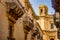 Balconies in Baroque style of Via Nicolaci in Noto, Sicily, Italy