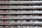 Balconies in a communist block of flats, architecture brutalism, socialist buildings, apartment entrances and windows