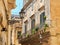 Balcony of a baroque palace in Lecce, Puglia.