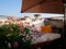 Balcony chill out - garten sofa, flowers and keep under umbrella