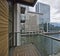 Balcony with city and dock view