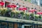 Balcony of le Procope, old restaurant in Paris, with red cafe umbrellas