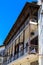 Balcony of an old colonial building in a street in an african ci