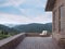 The balcony of the small house on the mountain in the evening 3d render