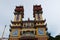 Balcony and two towers on the main facade of the Cao Dai Taoist temple. Hoi An, Vietnam