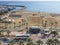 Balcony view over the Palm trees promenade, bus station, sea and port in Larnaca town