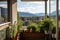 balcony with window garden and view of mountain range