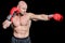 Bald boxer in fighting stance